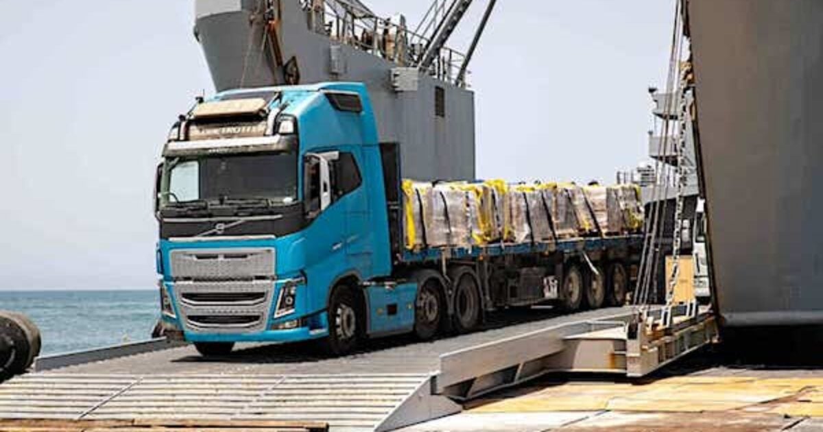An aid truck rolls off the U.S.-built floating pier on its journey to a U.N. warehouse in Gaza. (CENTCOM photo)